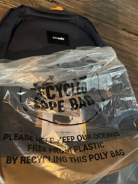 NWT Pacsafe Blue and Tan Two-Tone 15L Anti-Theft Backpack